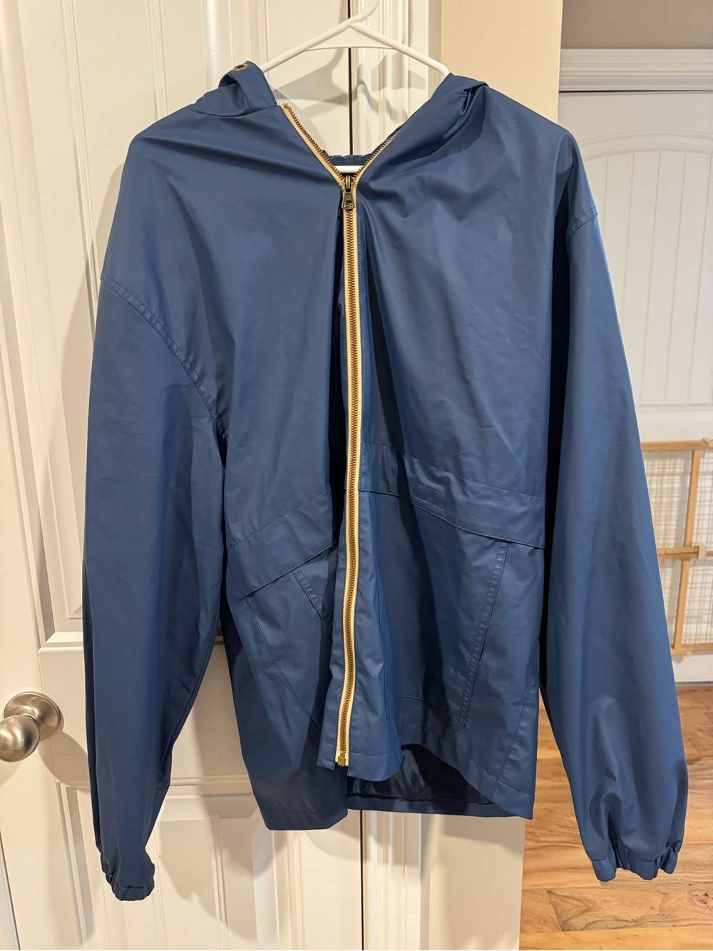 Weatherproof Blue Hooded Raincoat with Gold Zip